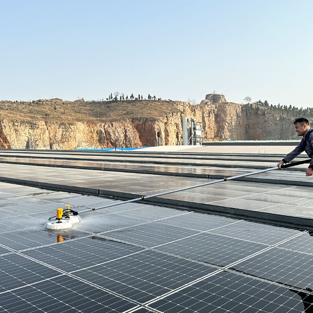 Large-scale commercial solar panel cleaning operation in South Africa using professional equipment