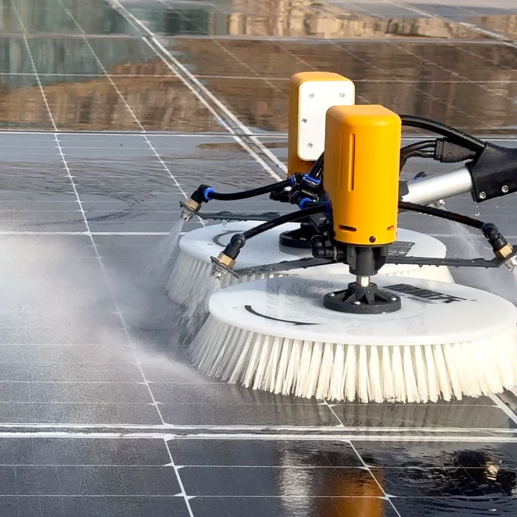 Professional solar panel cleaning in action on commercial solar installation in South Africa